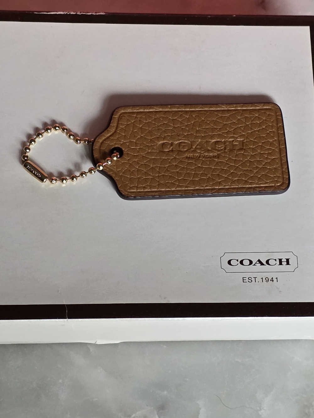 Coach Large Pebbled Leather Tag in Tan with Gold Chain